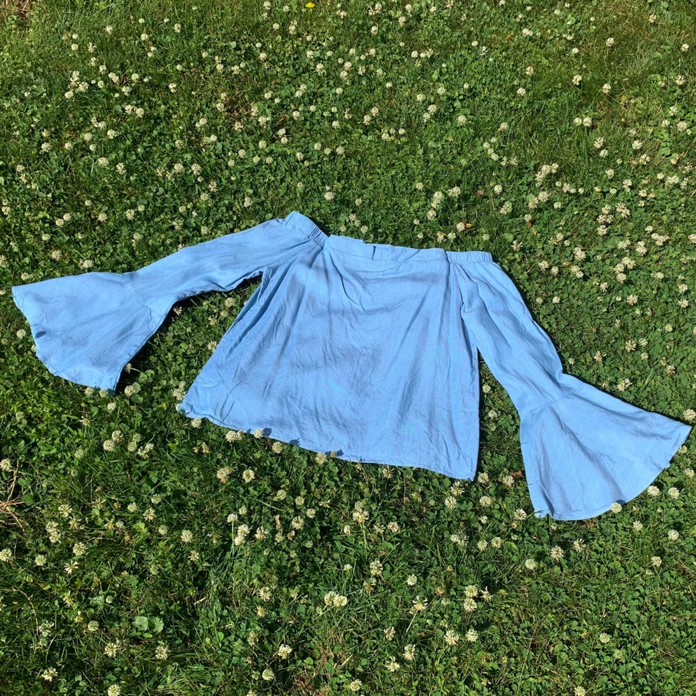 Blue Off the Shoulder shirt with flowy sleeves